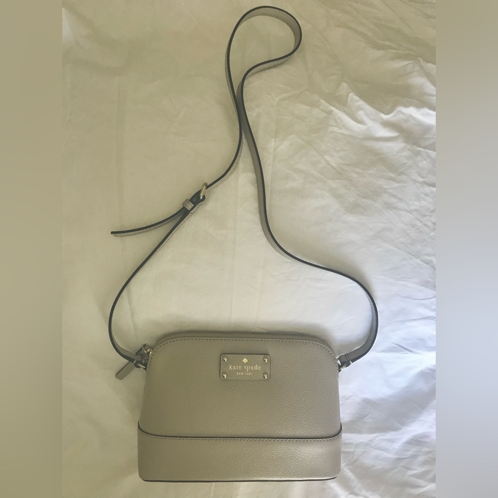 Kate Space Taupe Domed Cross Body Bag with dust bag included.